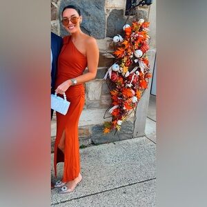 Burnt orange one shoulder with bow wedding guest dress